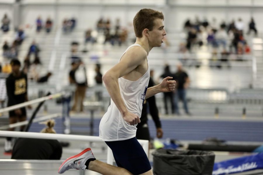 Washburn athlete swings his arms strongly on Jan 22, 2022, Topeka, Kan.