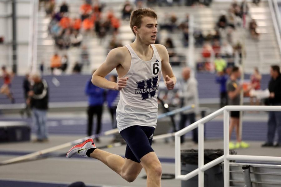 Washburn athlete for mile runs on Jan 22, 2022, Topeka, Kan.