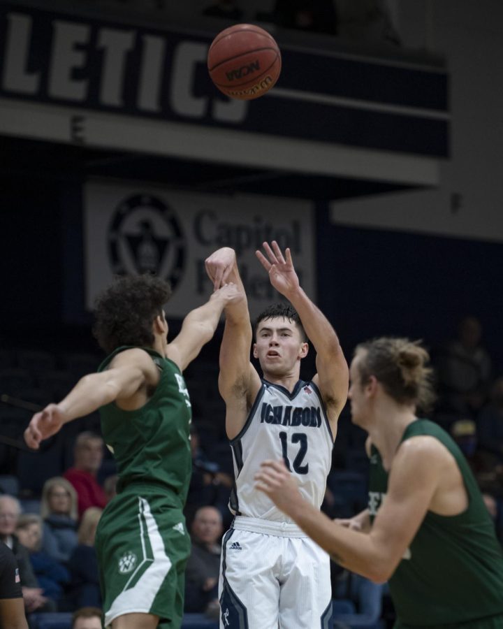 Washburn guard Tyler Geiman (12) shoots the ball Monday, Jan. 17, 2022, at Lee Arena in Topeka, Kansas. Geiman scored 14 points in the game.