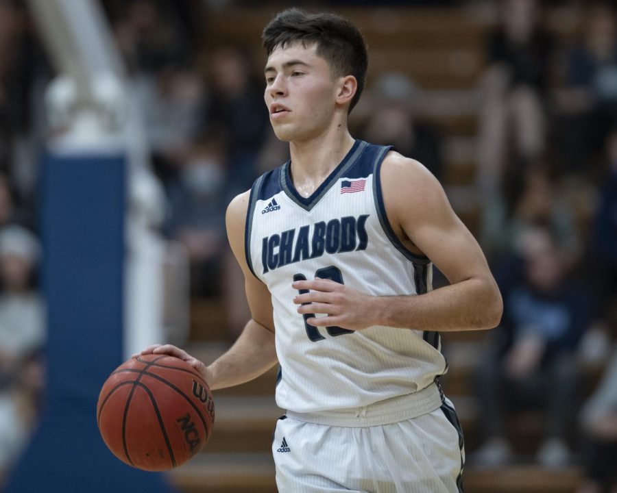 Washburn+guard+Tyler+Geiman+%2812%29+dribbles+down+the+court+Monday%2C+Jan.+17%2C+2022%2C+at+Lee+Arena+in+Topeka%2C+Kansas.+Geiman+recorded+four+assists+in+the+game.
