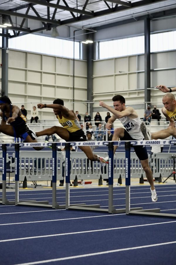 Washburn athlete participates 60m hurdles on Jan 22, 2022.