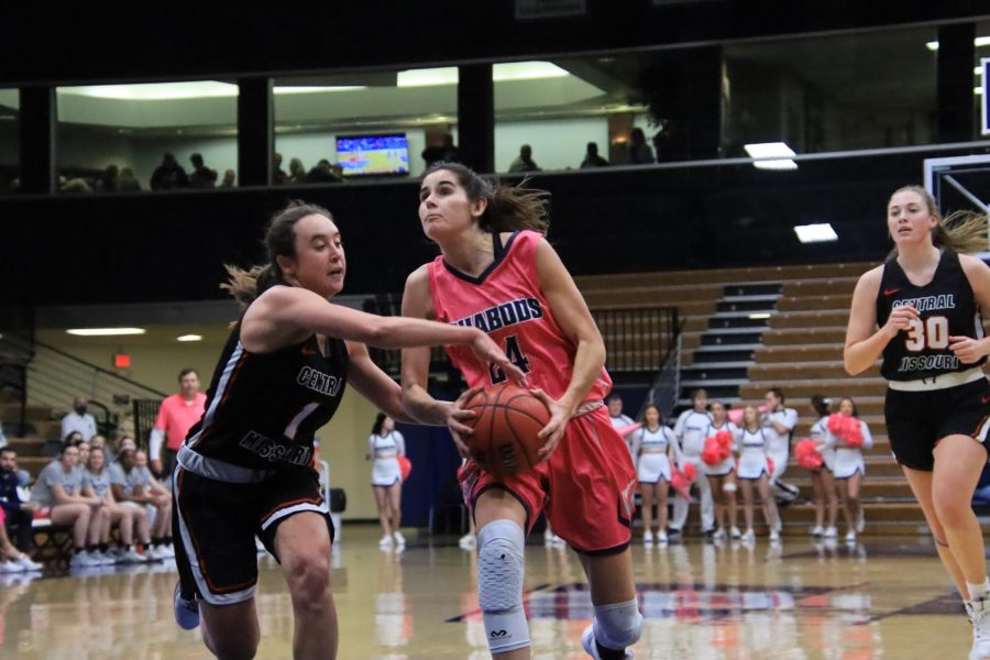 Senior guard Nuria Barrientos drives to the basket Feb. 12, 2022. Barrientos scored 12 points in the game.
