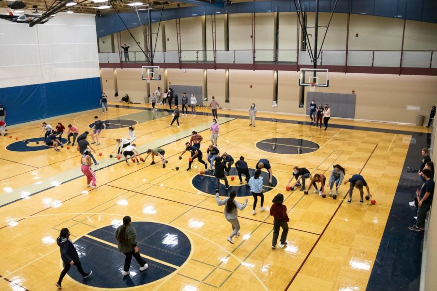 Students battle each other for the foam balls. Late Night at the Rec was Feb. 25, 2022.