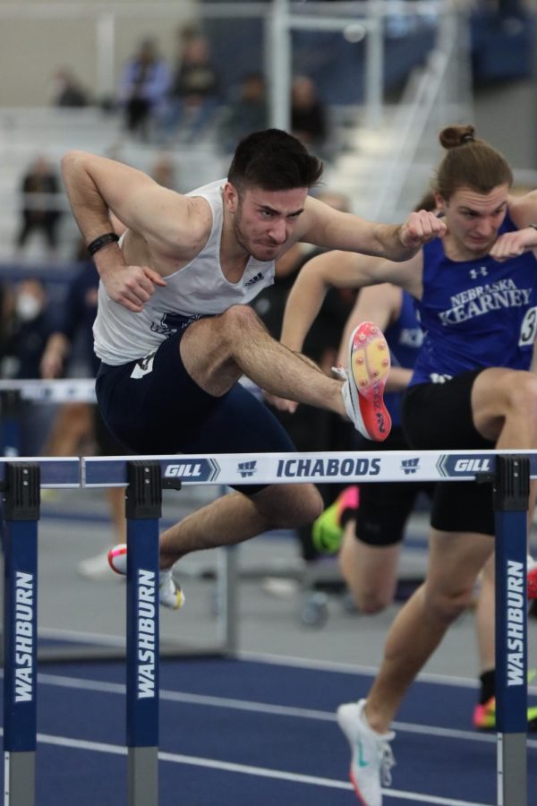 Romain Henry avoids the hurdle in the 60 meter hurdles. He finished with a time of 8.15 Feb. 12, 2022, Topeka, Kansas.