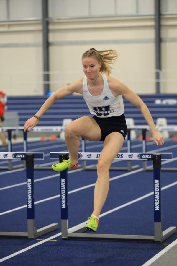 Washburn senior Nikki Kraaijeveld leaps in the  60-meter hurdles Jan. 29, 2022, Topeka, Kansas. Kraaijeveld finished fifth place in the finals.