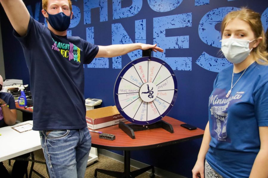 SRWC employee Brennan Wetter facilitates the prize wheel. Late Night at the Rec was Feb. 25, 2022.