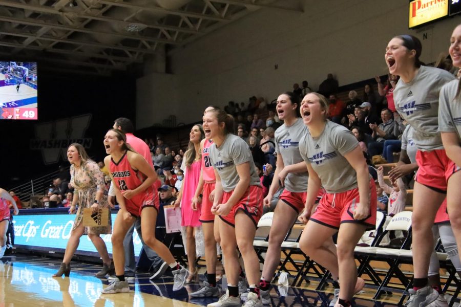Washburns bench celebrates after scoring in the third quarter Feb. 12, 2022. The Ichabods defeated Central Missouri 72-71 in the game.
