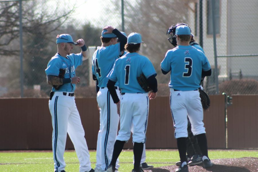 Washburns+infield+meets+on+the+mound+Feb.+26%2C+2022.+The+Ichabods+defeated+Fort+Hays+State+3-2+in+the+game.