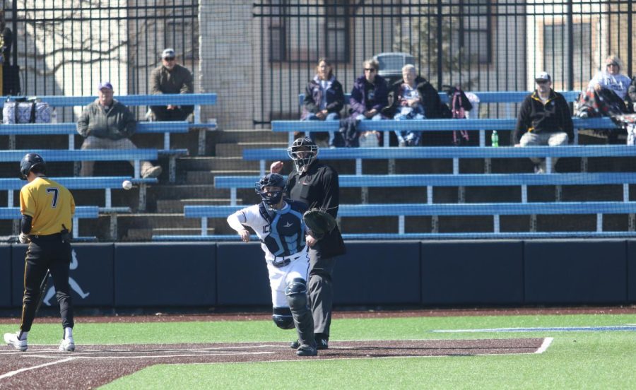 Sophomore Otto Jones throws the ball down to third base Feb. 27, 2022, Topeka, Kansas. Jones had two hits in the game.