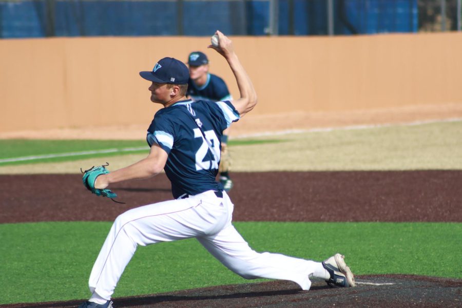 Jake Schroeder (29) throws the ball Feb. 28, 2022, Topeka, Kansas. The Ichabods won 14-9 in the game.