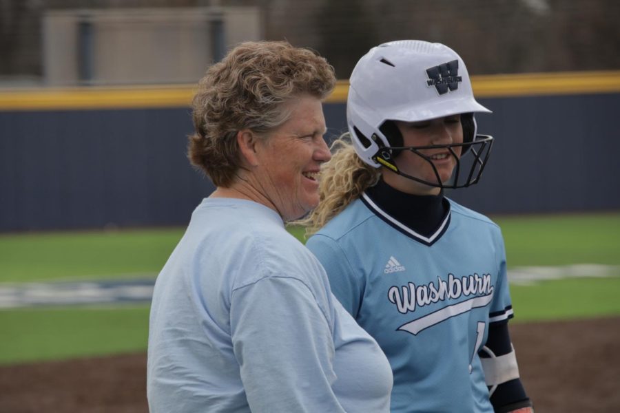 Brenda+Holaday+%28left%29+and+Marrit+Mead+%281%29+talks+on+third-base+Mar.+5%2C+2022%2C+Topeka%2C+Kansas.+Mead+had+two+hits+in+the+first+game+of+the+day.