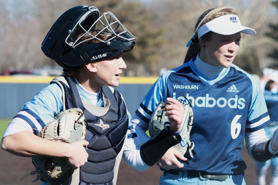 Skylar Darnell communicates with Hadley Kerschen (6) Feb. 27, 2022, Topeka, Kansas. Washburn defeated the University of Sioux Falls 8-0 in the game.
