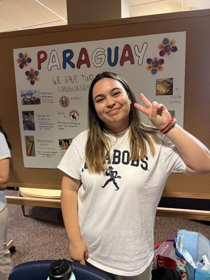 Student Laura Santander Díaz poses for a picture at the Celebration of Cultures event. The Washburn International Club hosted the event in the Memorial Union April 20, 2022.