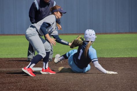 Washburn sophomore Marrit Mead (1) tries to run to second base April 25, 2022, Topeka, Kan. Mead had one hit in game one of the day.