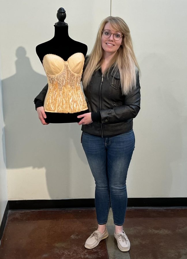 Lindman shows one of her three bodysuit pieces. Lindman will be presenting her exhibit beginning May 6 in the Mulvane Art Museum.