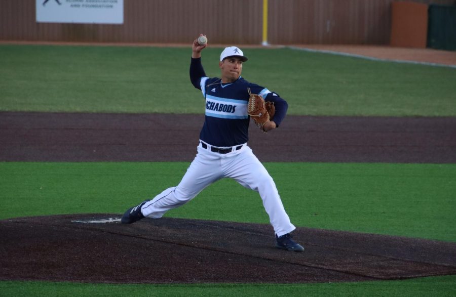 Senior Joel Casillas throws a pitch April 8, 2022. Casillas threw one scoreless inning in the game.