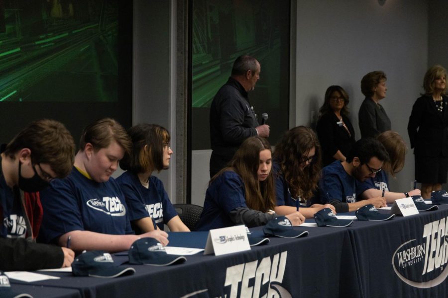 Prospective graphics technology sign their letters of intent. The National Technical Letter of Intent Signing Day took place on Washburn Techs Huntoon campus April 14, 2022.