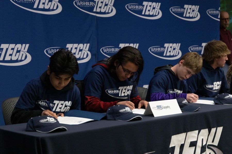Prospective students sign their letters of intent to attend Washburn Tech in the fall. The total number of signees for the day was 305.