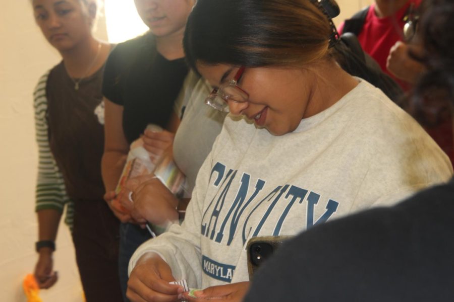 Students receive their tickets at HALO’s organization first meeting. This meeting was held Sept. 15.