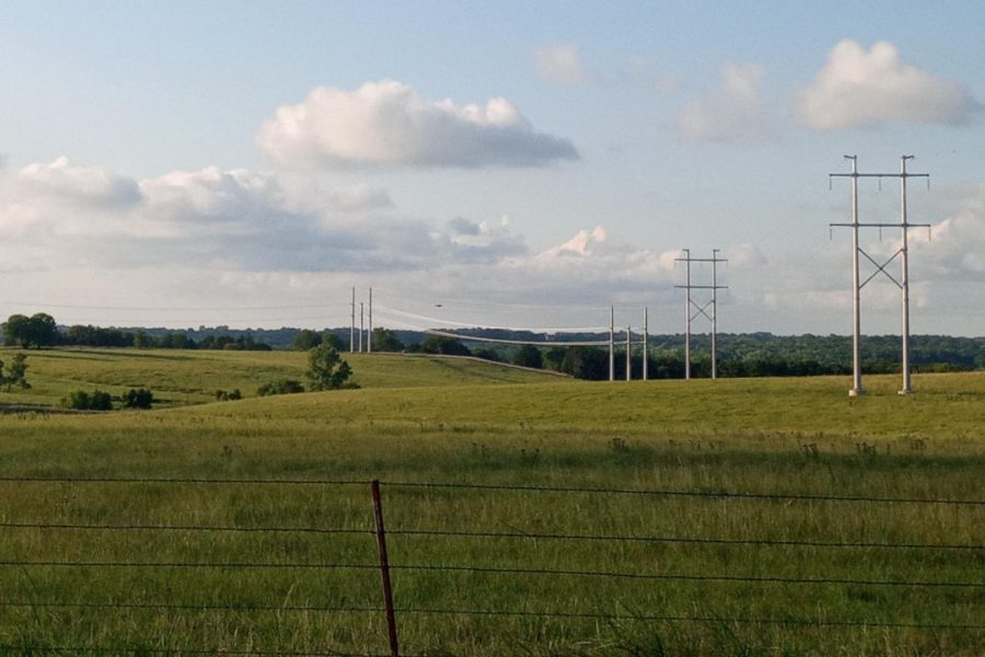 Evergy transmission lines change direction southeast of Topeka in this photograph taken Saturday, July 30, 2022. This particular section was brought into service last winter.