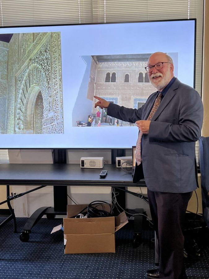 Tom Prasch smiles for a picture as he discusses Moorish art at a recent International Brown Bag Lecture. The lecture was held Sept. 7 in the International House.