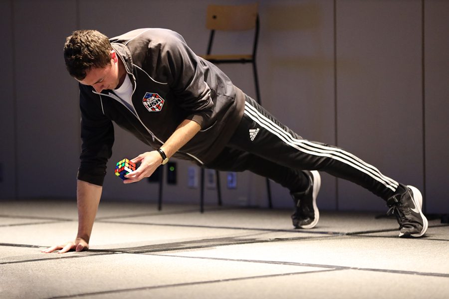 Samuel Pollom, representing Lunch Buddies, does seven reps of one-handed pushups while solving a Rubik’s Cube. Pollom took home the first place win for Rising Stars and has been to 21 Rubik’s Cube competitions in the last eight years and has two national appearances and two state titles.