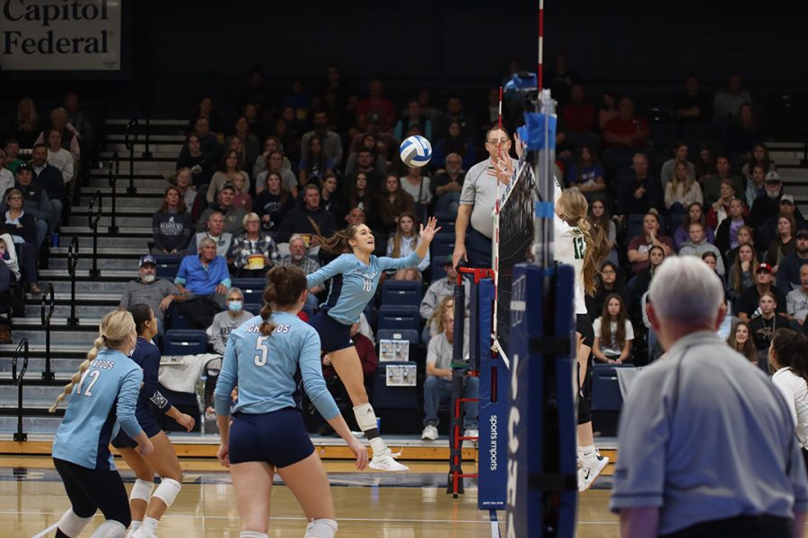 Sophomore Jalyn Stevenson (#10) leaps to deliver a killer spike. Stevenson played in all 37 matches in 2021 and started 30 of them.