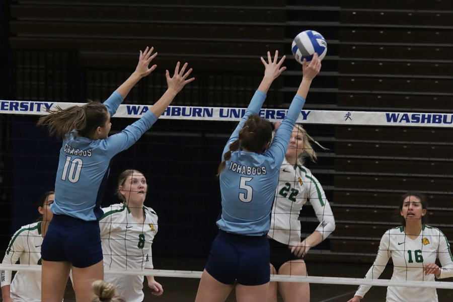 Jalyn Stevenson (#10) and Kassidy Pfeiffer (#5) block an incoming ball from MSSU’s senior, Kierson Maydew (#22). The game ended with a loss for Washburn with a final score of 2-3.