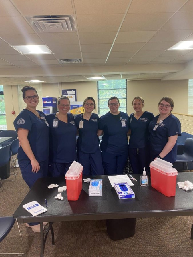 Washburn nursing students get ready to give flu shots to students on campus. 
The flu shot drive took place in the Memorial Union.