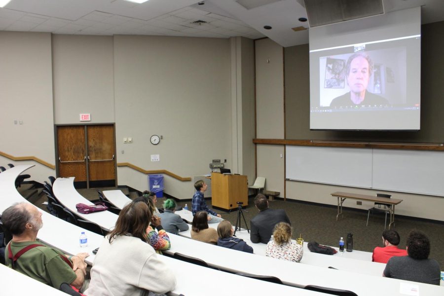 Students and Washburn Fimmakers Association listen as Allan Holzman, editor and director, talks about his film. Tuesday Oct. 25., Holzman showcased his new film C-C-Cut during the WFA meeting.