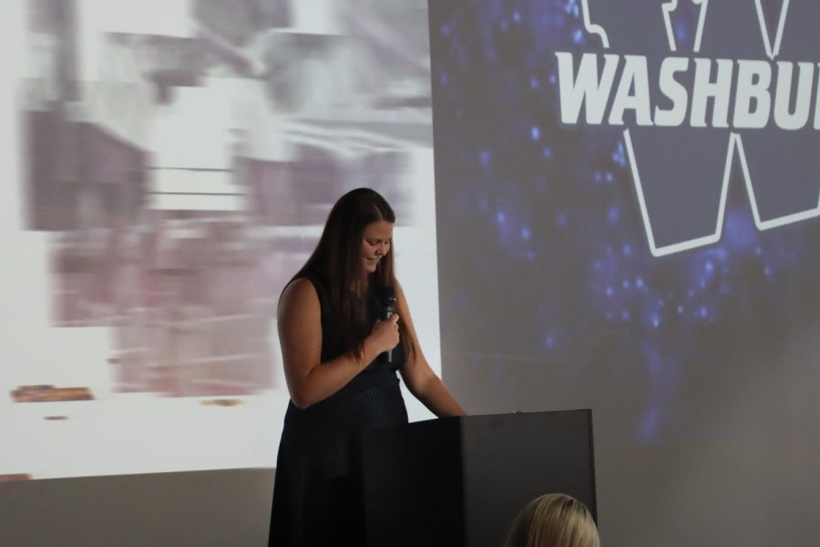 Former Washburn volleyball player Breanna Lewis gives her acceptance speech. Lewis was one of many individuals with the honor of being inducted into the hall of fame.