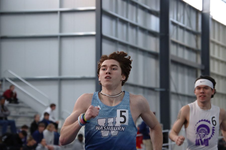 Jayce Brenner, freshman in psychology, races around the track in the 600-yard run. Brenner placed 12th in the event with a time of 1:15.42.
