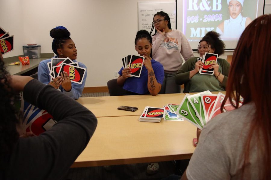 Amari Rawls, sophomore in occupational therapy, Makaela Lewis, sophomore in social work, Hannah Mae Atakpa, student in public administration and STEM, play Giant UNO. They tried their best to win. 