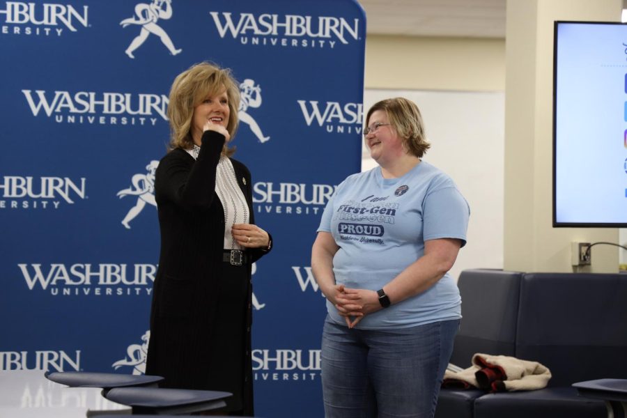 President JuliAnn Mazachek invites Jennifer Henson, recipient of the “First-generation Family of the Year” award, to speak on her accomplishment. Recognizing students and families for their dedication has been a long tradition for Washburn. 