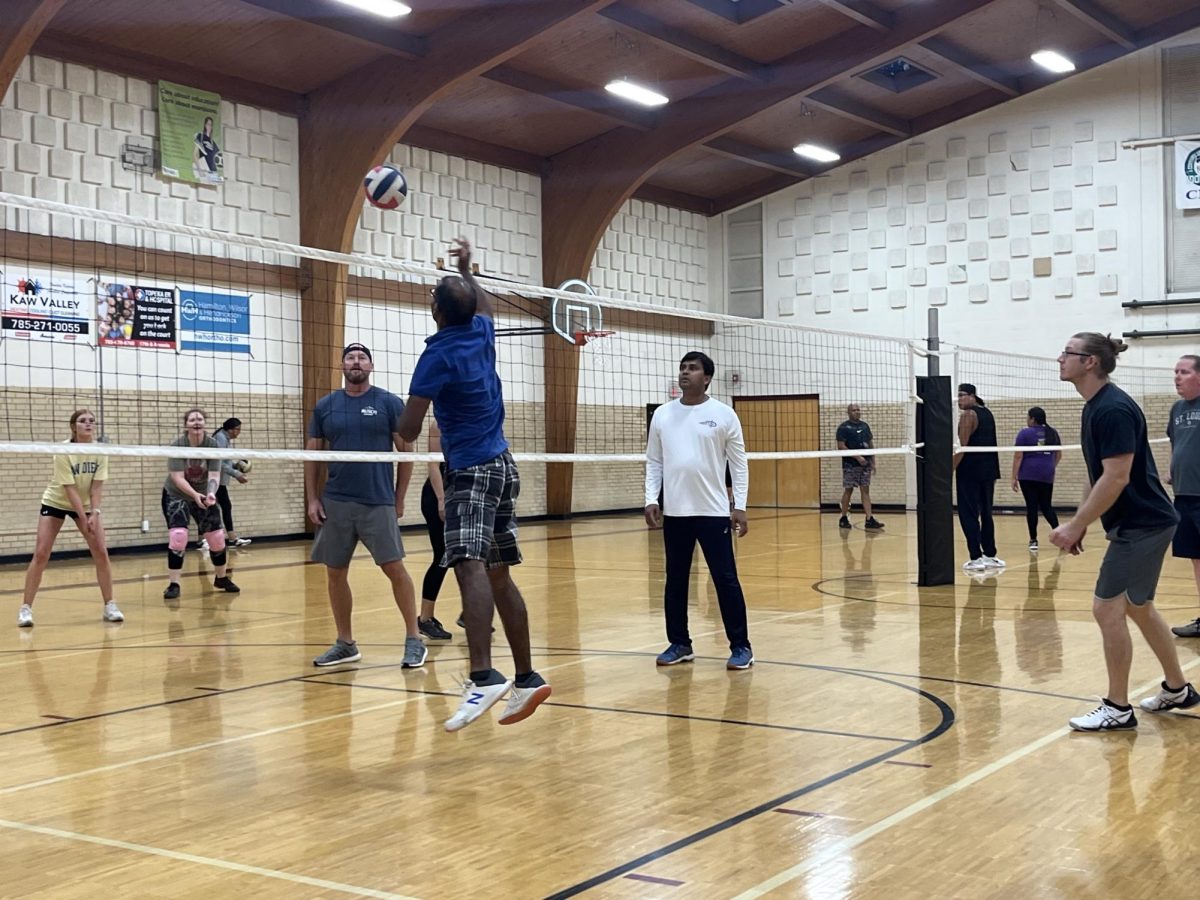 Open gym visitors start up a game of volleyball. Volleyball games are held on Tuesdays and Thursdays from 7 p.m. to 9 p.m.