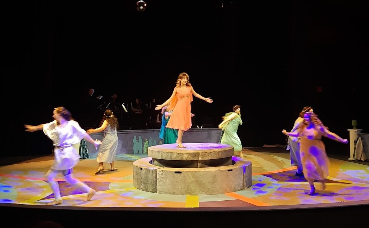 The nine muses of Mount Olympus take center stage. The seven danced on stage with the other two on the piano.
