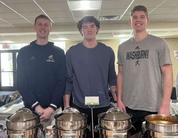 Student-athletes seek support from Washburn for upcoming games. A few student-athletes from the mens basketball and womens tennis, passed out soup and ice cream in the Union to promote their games. 