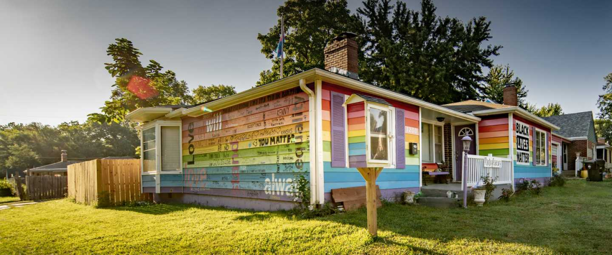 The Equality House makes a political statement supporting gay rights. It was painted in 2013 and was especially effective with its intent as it is across the street from the Westboro Baptist Church that is known for its opposing thoughts and feelings.