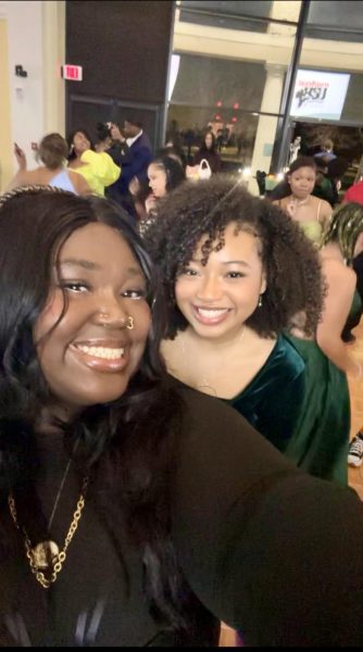 Aja Carter and LeSha’ Davis both Black women describe their experiences and the challenges of being in a higher-up position. Photo was taken at the Black Student Union 2024 Ball.