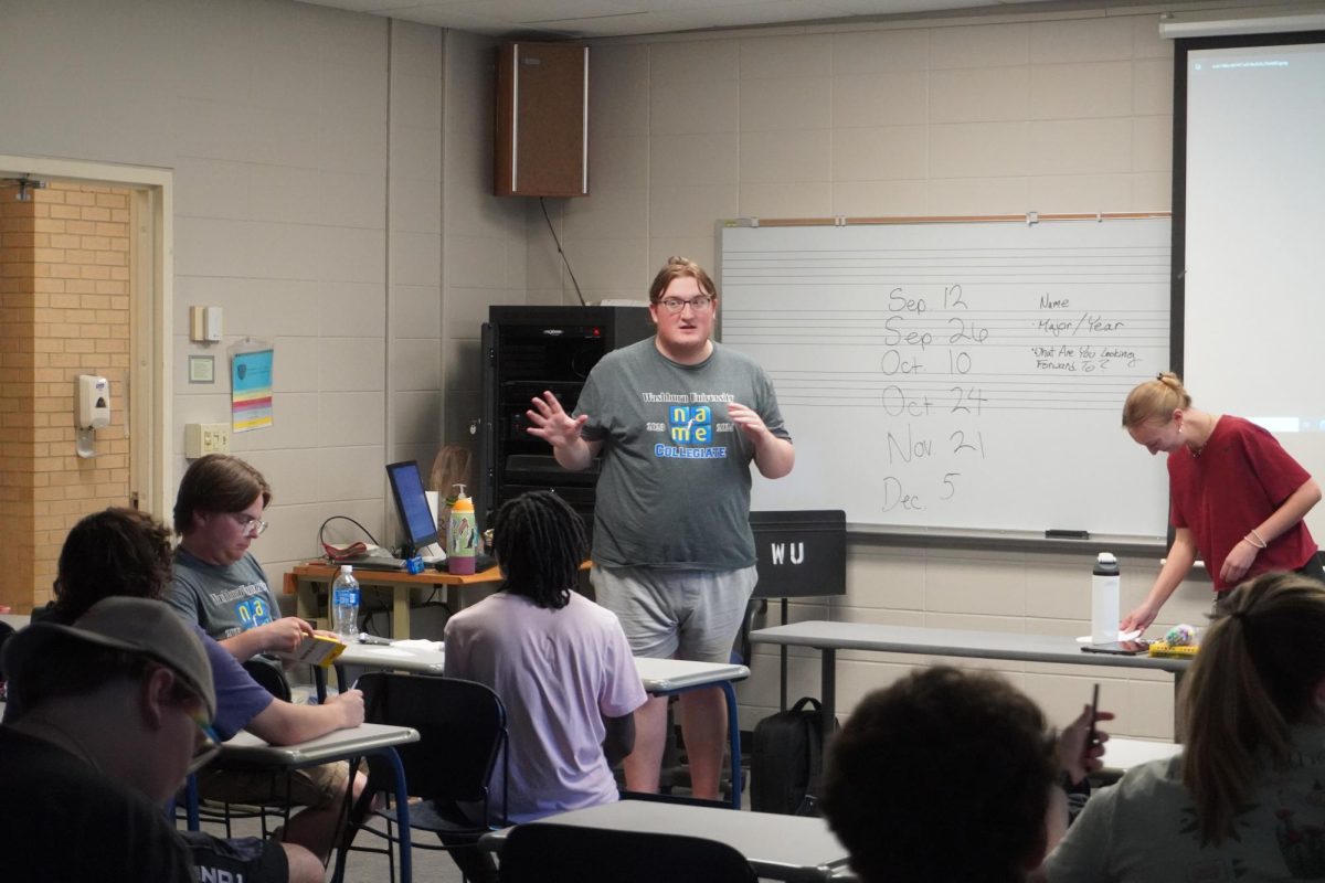 Dylan Rizzo, president of National Association for Music Educators, speaks to the group during the meeting. NAfME is a student organization for any students with a major or minor in music education or are involved in an ensemble.