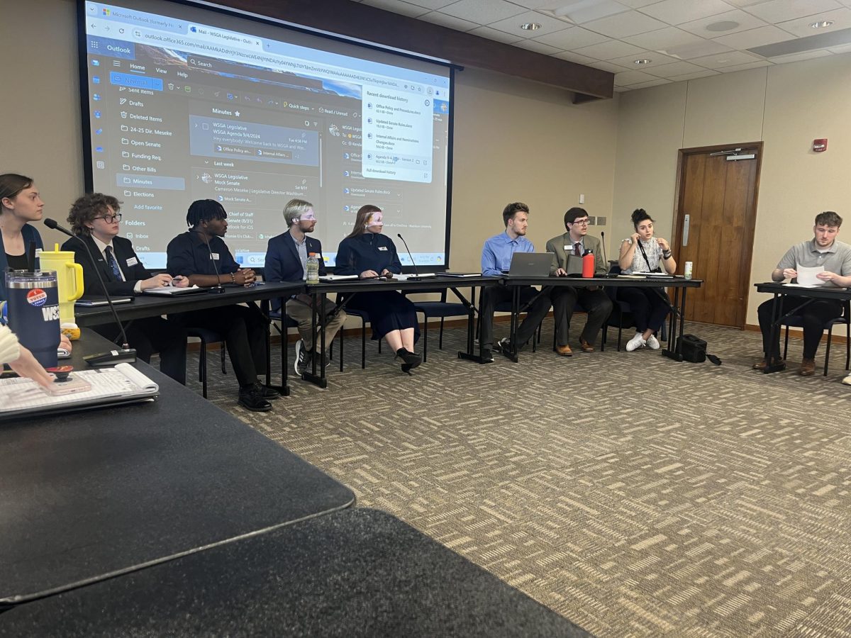 Members of the WSGA Cabinet sit and prepare for the first meeting of the academic year. The meeting’s main purpose was the induction of new senators and changing the voting process within WSGA senate meetings. 