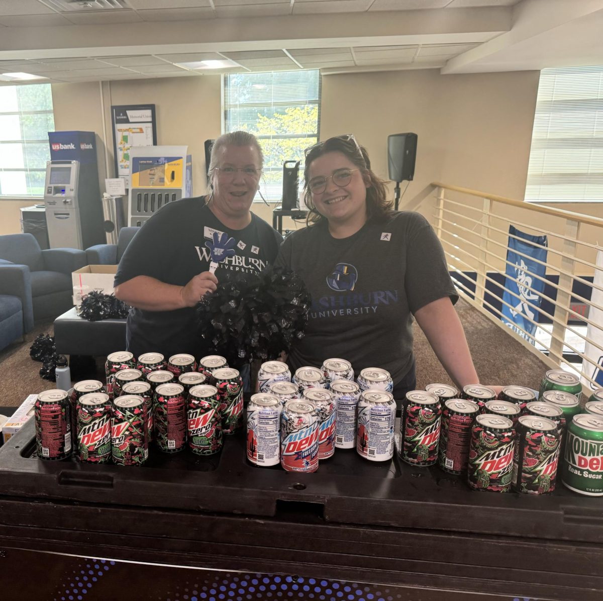 Two workers pass out free drinks in the Memorial Union. The Union Daze is an event that takes place throughout the first two weeks of the school year. 