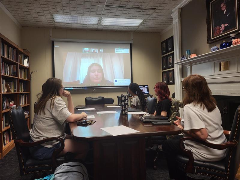 Kayla DeVore, senior criminal justice major and club president, leads the meeting via Zoom greeting new and returning members. At the meeting, there were seven students present both on Zoom and in-person.
