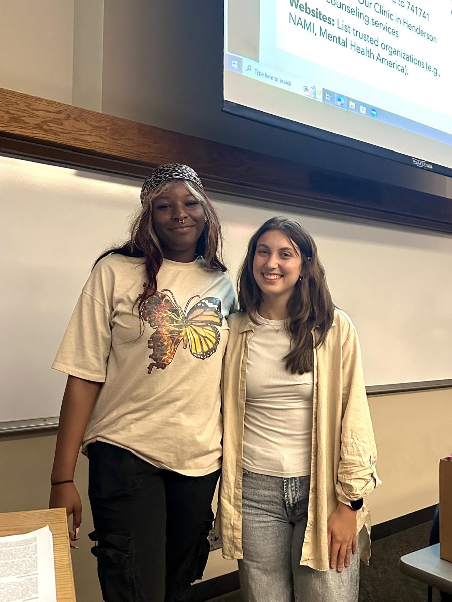 Carter Johnston (right), sophomore psychology major and president of the Psychology Club, poses with a fellow club member after the Psychology Club’s mental health meeting. The meeting discussed matters on mental health and what can be done to provide support for it. 