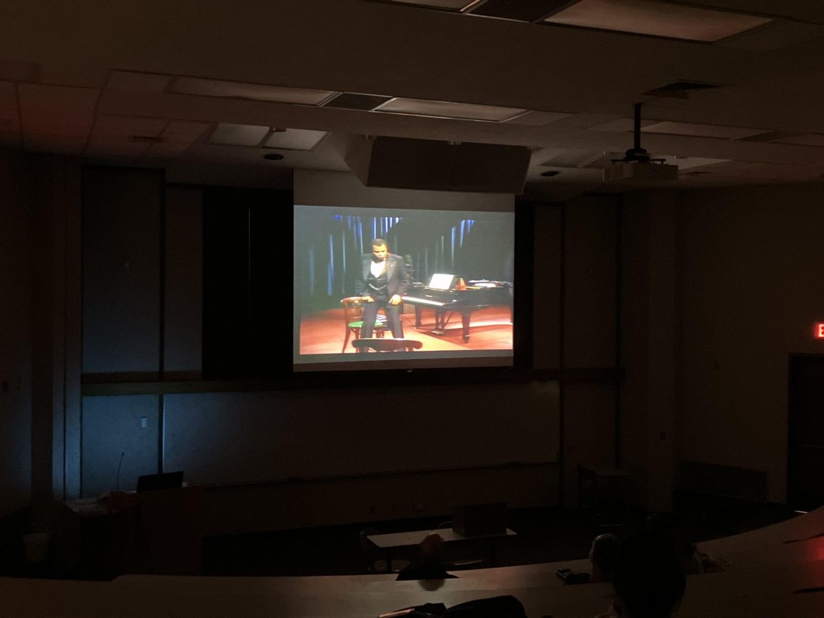 Students watch the movie at the Historical Movie Night event. They were there to learn about the life of Paul Robeson from the film.