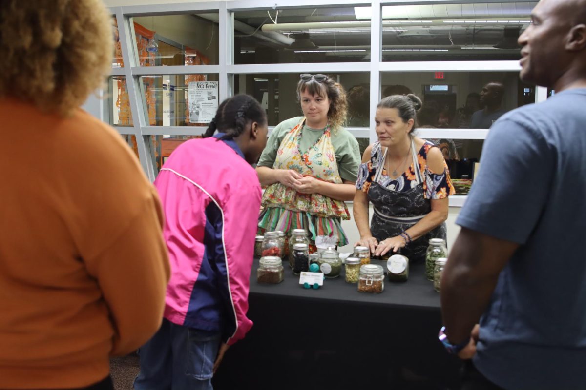 Students and faculty crowd around a table to learn more about the health benefits offered in tea. This event was hosted by Washburn’s Multicultural Intersectional Learning Space. They invited Kansas Notions to campus for a demonstration. 