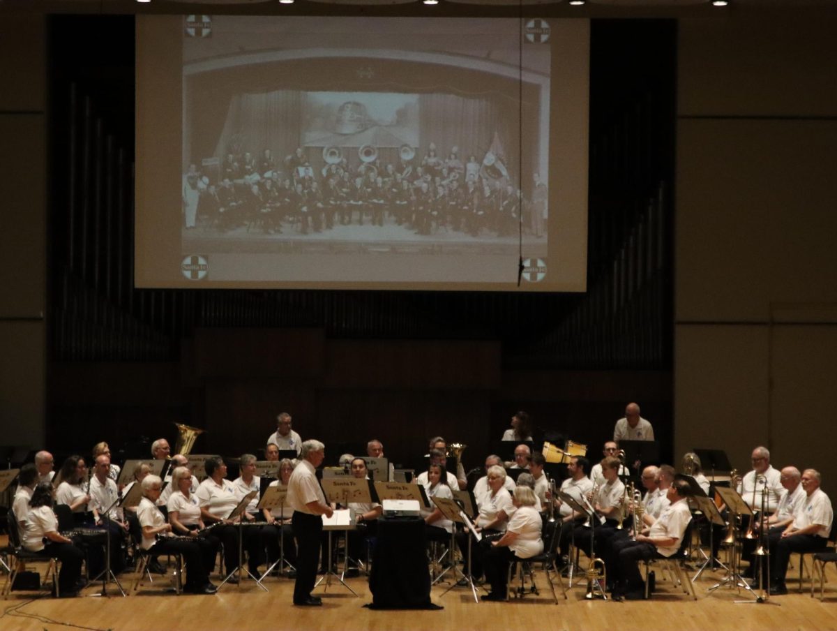 The Santa Fe Band, led by a smiling conductor, fills the stage with rich sounds of classical music. Each piece was executed flawlessly, leaving the crowd thoroughly impressed and entertained.
