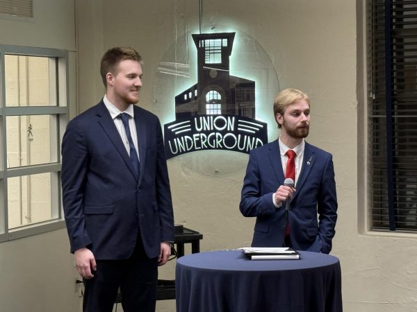 Trevor Ottman, chief of staff (left), and Nick Lloyd, budget director (right), give their pitch for their presidential campaign. Ottman will be running for president and Lloyd will be running for vice president.
