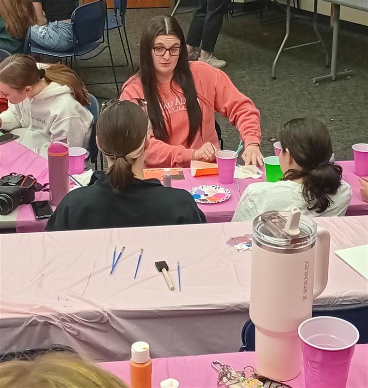 Event attendees share a casual talk. ZTA has created a space where women can have fun, learn different new things like painting and many other engaging programs. 