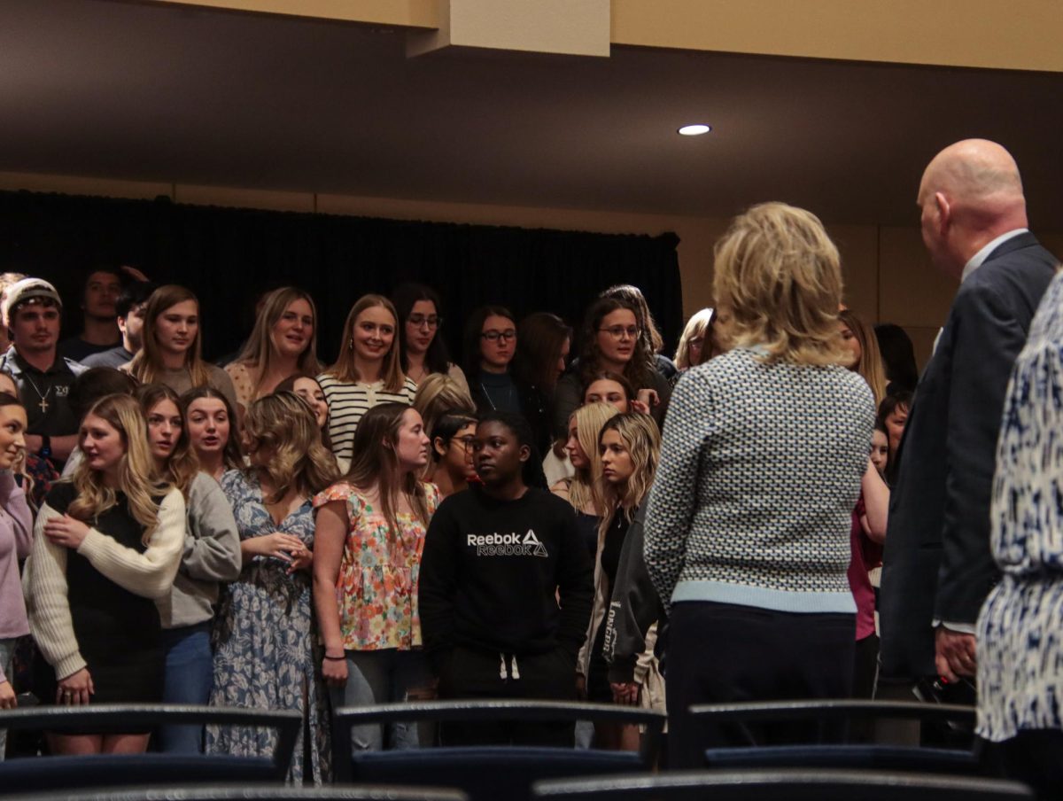 Mazachek and Bearman address students before a group photo. They helped organize the scholars for a final celebration.